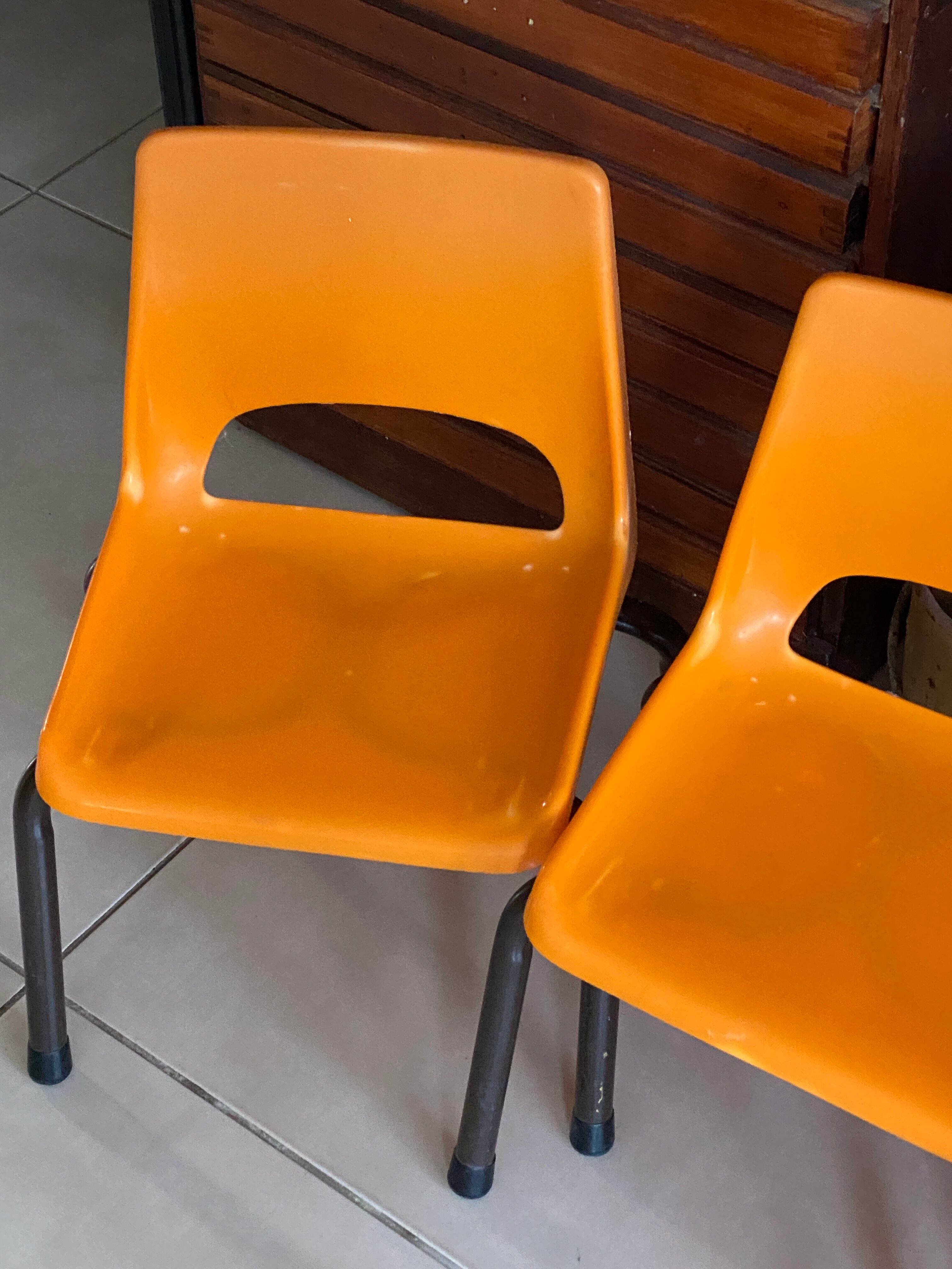 Set of 4 orange school chairs