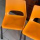 Set of 4 orange school chairs