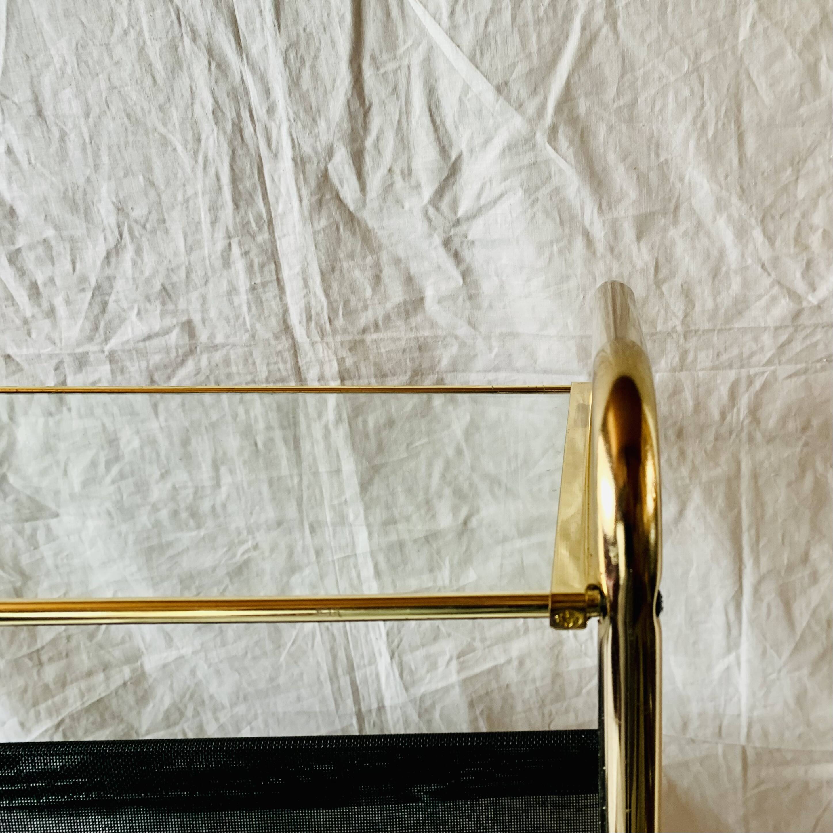 Magazine rack, saddle on vintage wheels