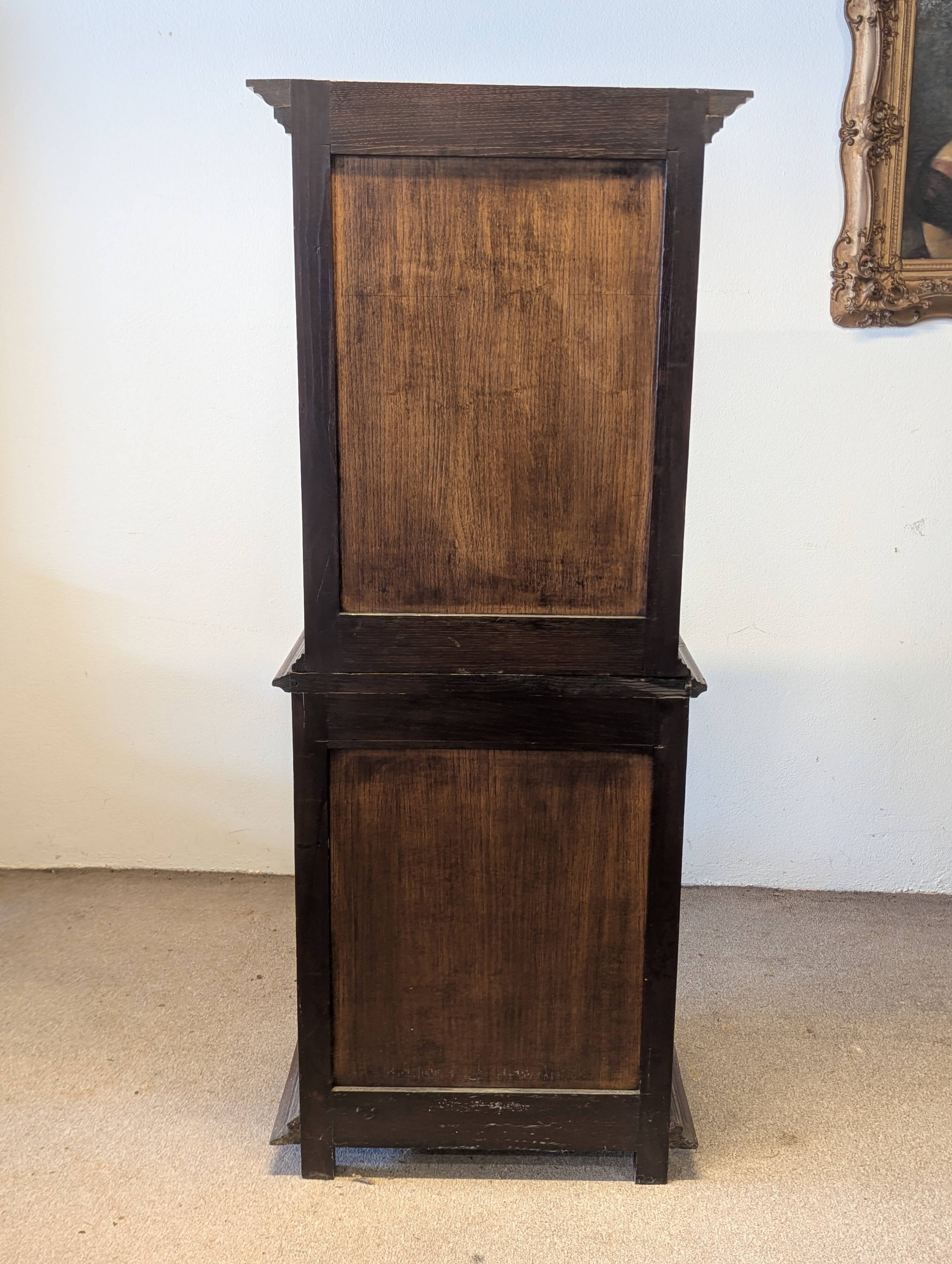 Two-body display cabinet in oak, Henri II style.
