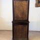 Two-body display cabinet in oak, Henri II style.
