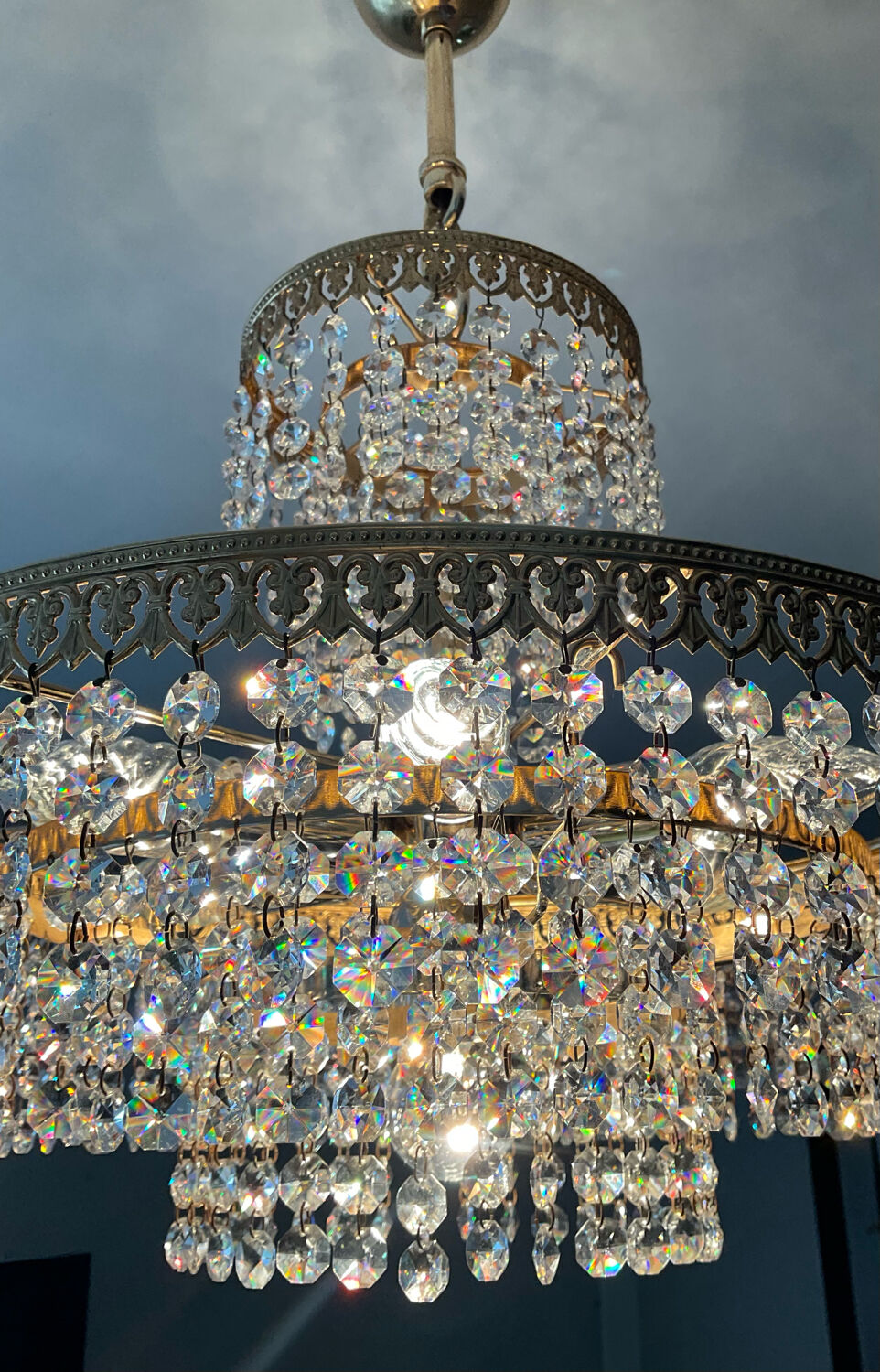 Brass chandelier and crystal tassel waterfall