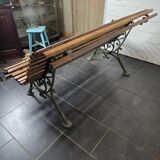 Old cast iron garden bench with oak slats