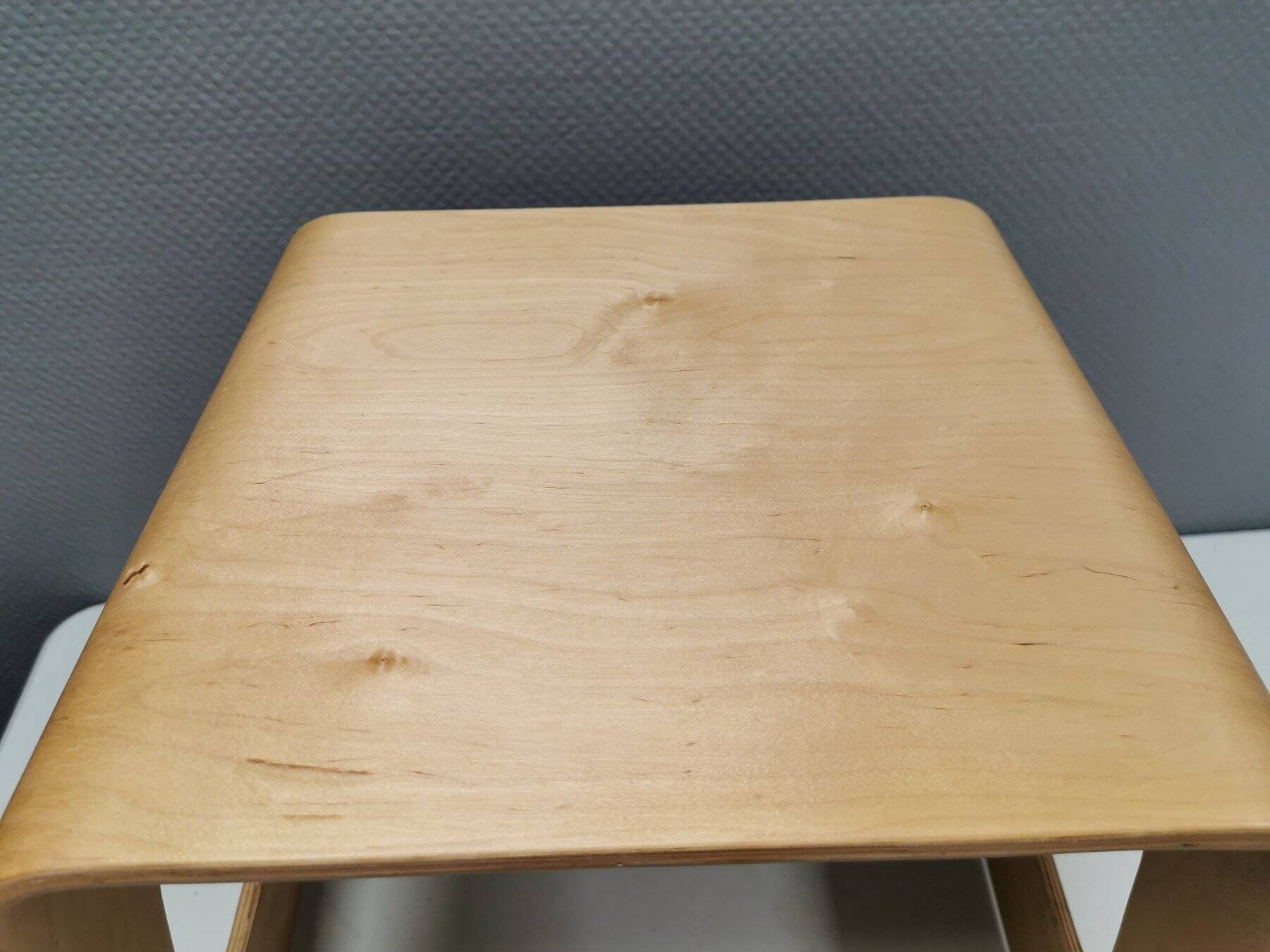 Beautiful design stool/side table made of curved plywood and designed by Lisa Norinder for Ikea.