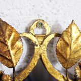 Old candlestick mirror gilded with leaf