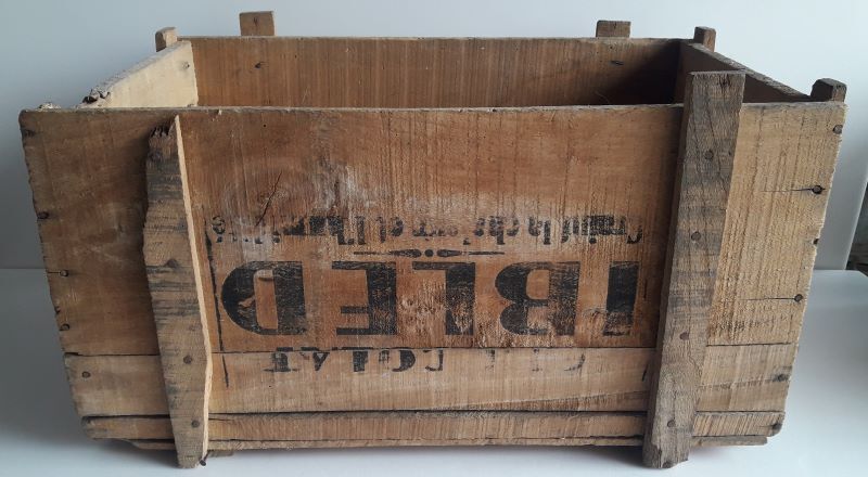 Ibled chocolate box in old wooden transport