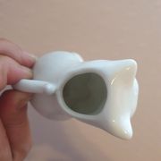 Small milk jug porcelain cream pot in the shape of a vintage cat