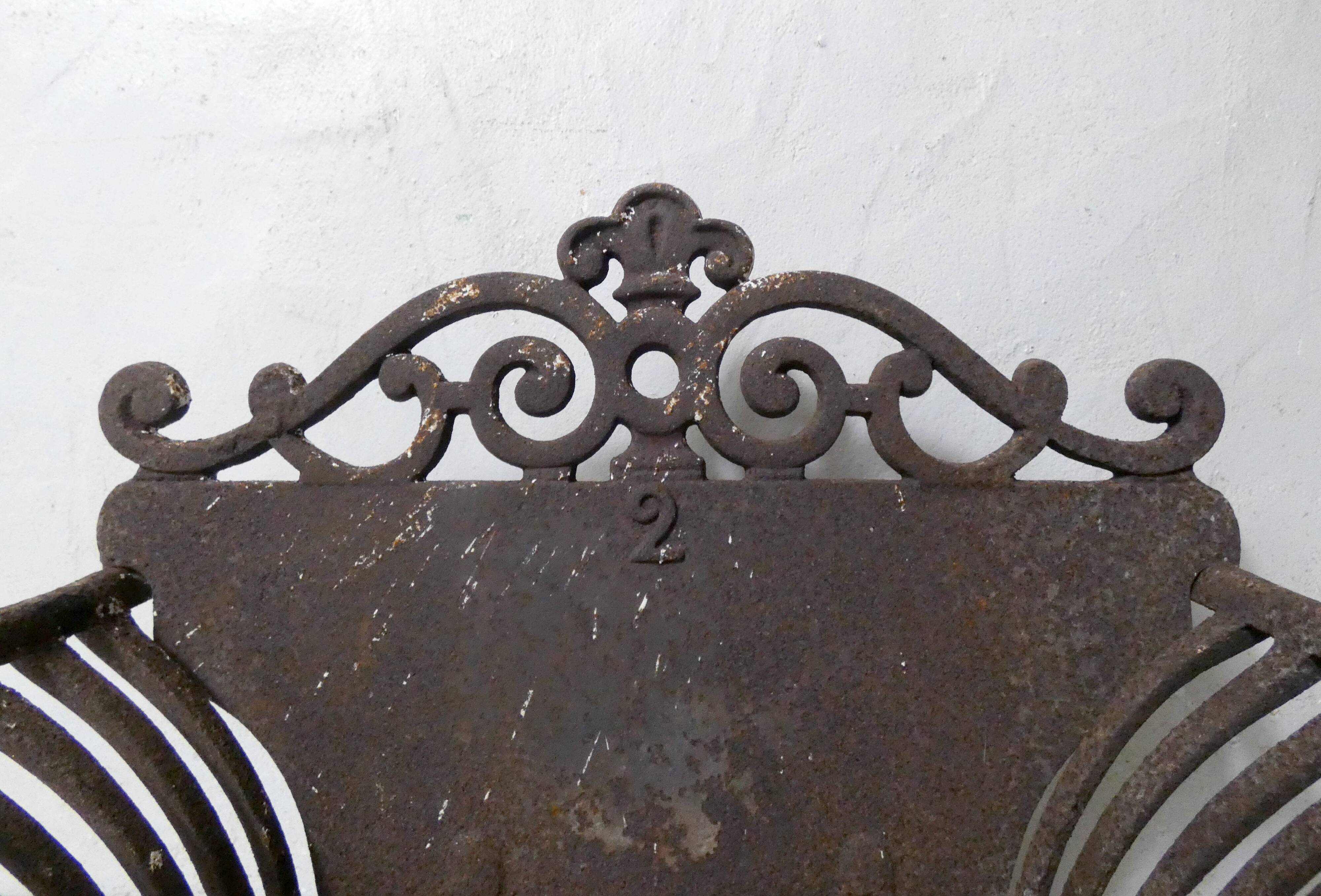 vintage cast iron log holder