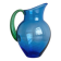 Translucent blue glass jug with a green handle.