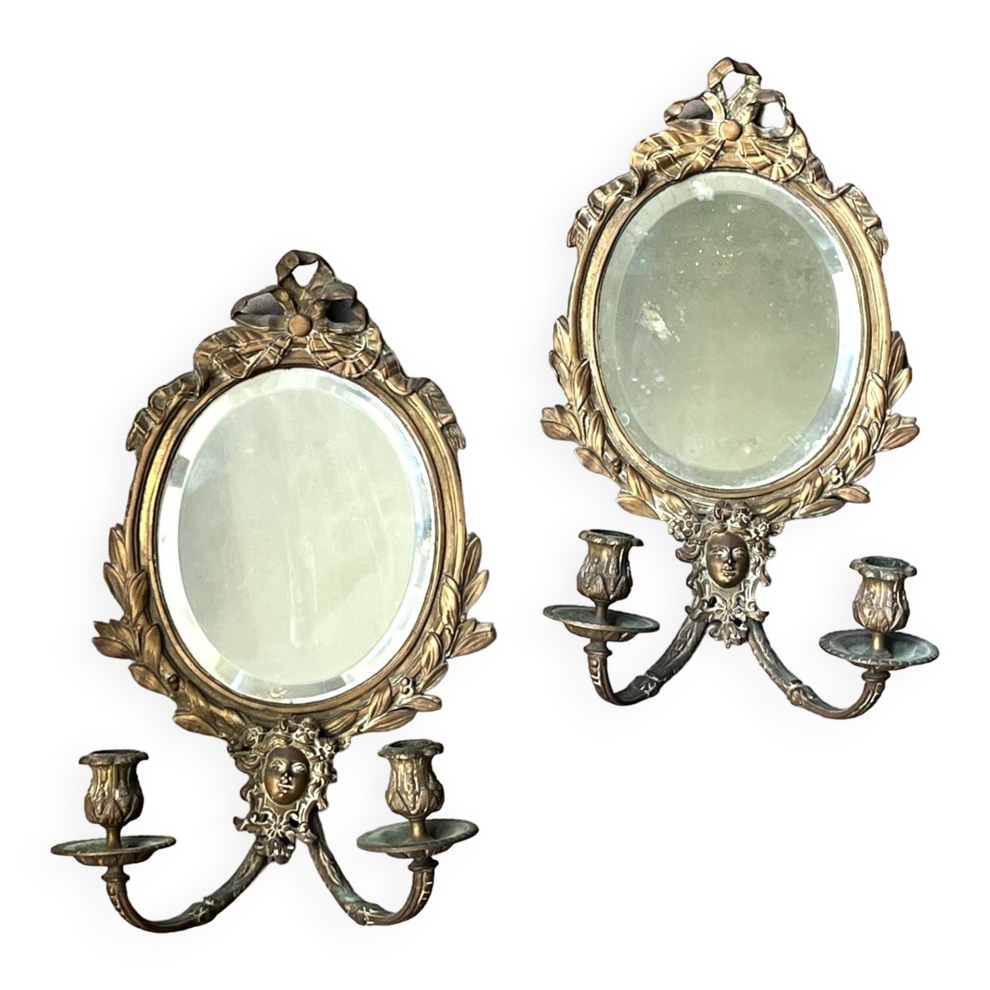 Pair of mirror sconces with bronze candlesticks from the 19th century.