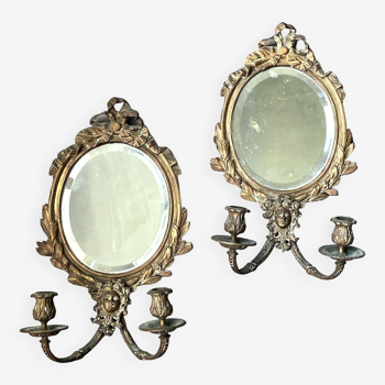 Pair of mirror sconces with bronze candlesticks from the 19th century.