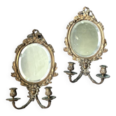 Pair of mirror sconces with bronze candlesticks from the 19th century.