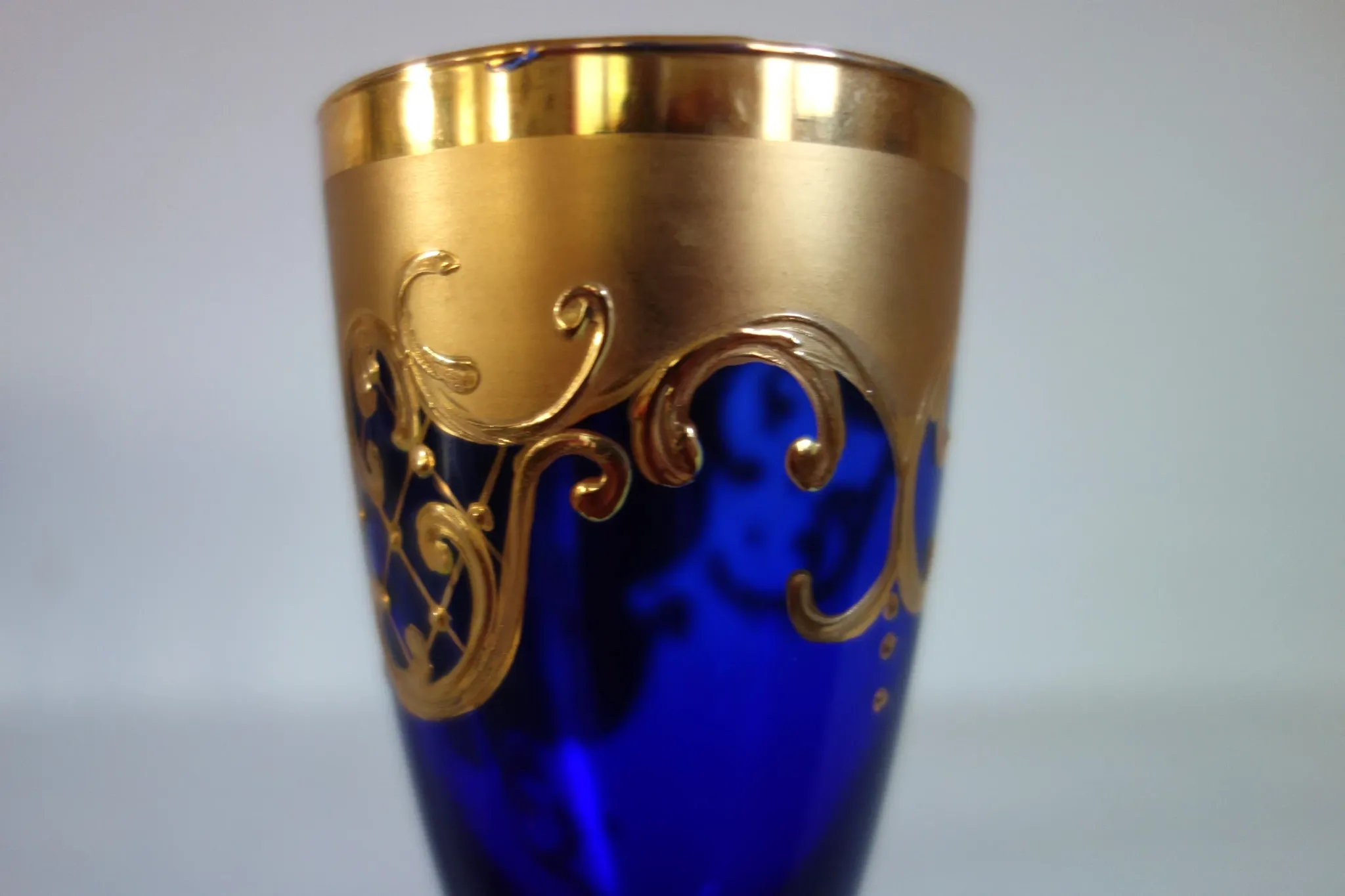 12 cobalt blue and gold Murano glass flutes, mid-20th century.