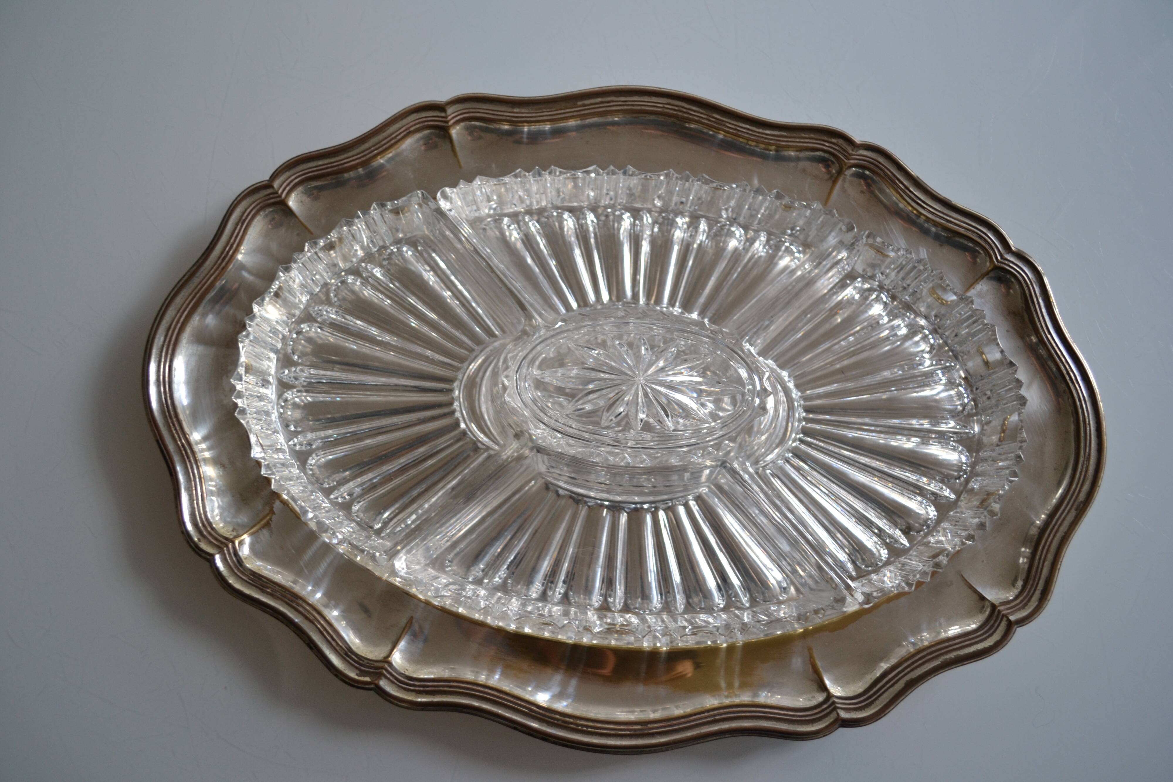 Silver-plated metal aperitif serving tray with HKE hallmark and glass.