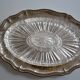 Silver-plated metal aperitif serving tray with HKE hallmark and glass.