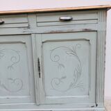 Carved buffet green-of-gray and raw wood