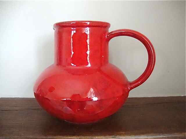 Red ceramic pitcher