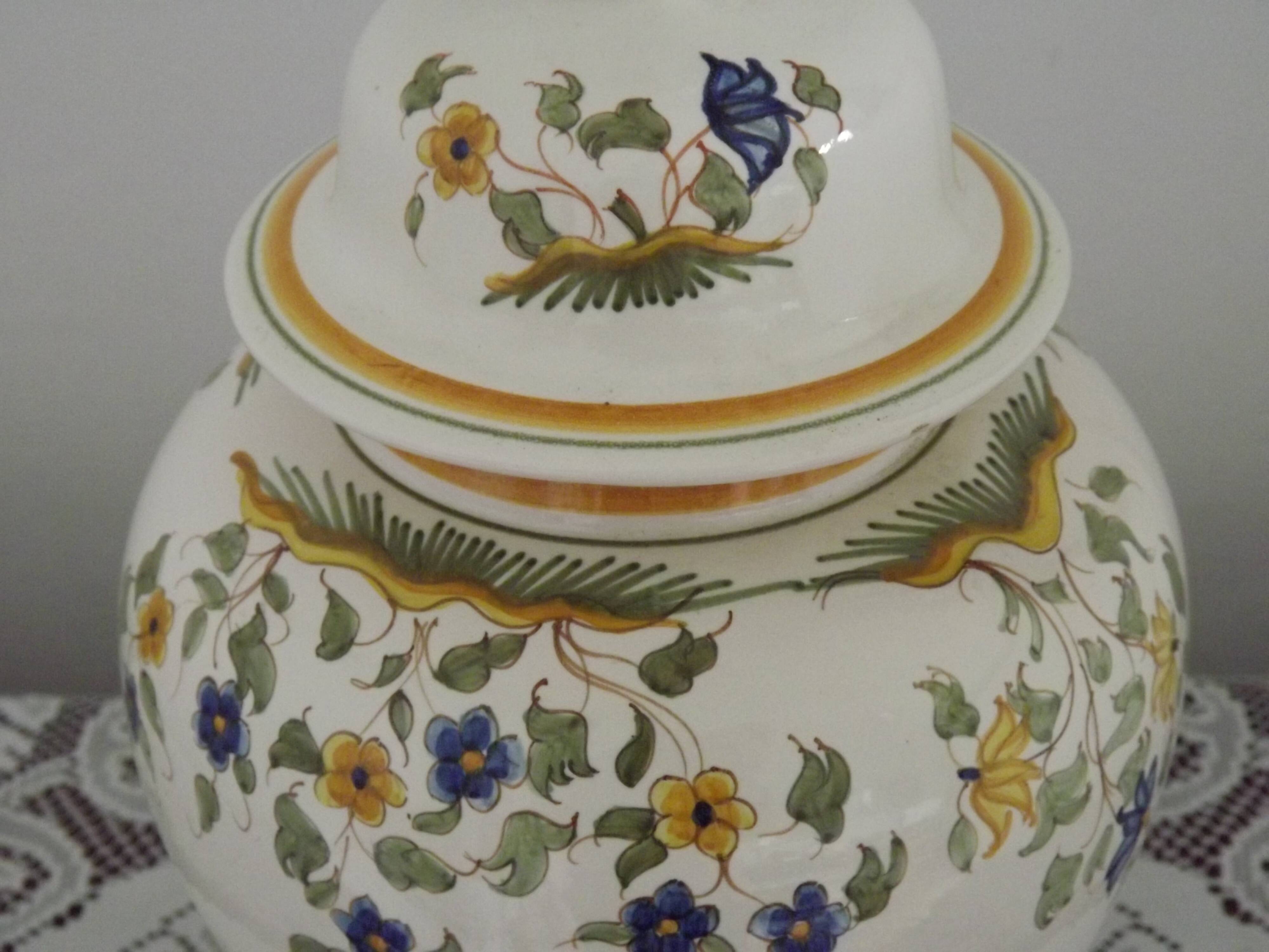 Table lamp with wooden base and fringed shade