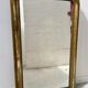 Miroir Louis Philippe en bois et stuc doré XIX siècle