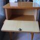 Modernist bedside table from the 1950s with compass legs.