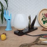 Art Deco swan and white globe table lamp with black marble base