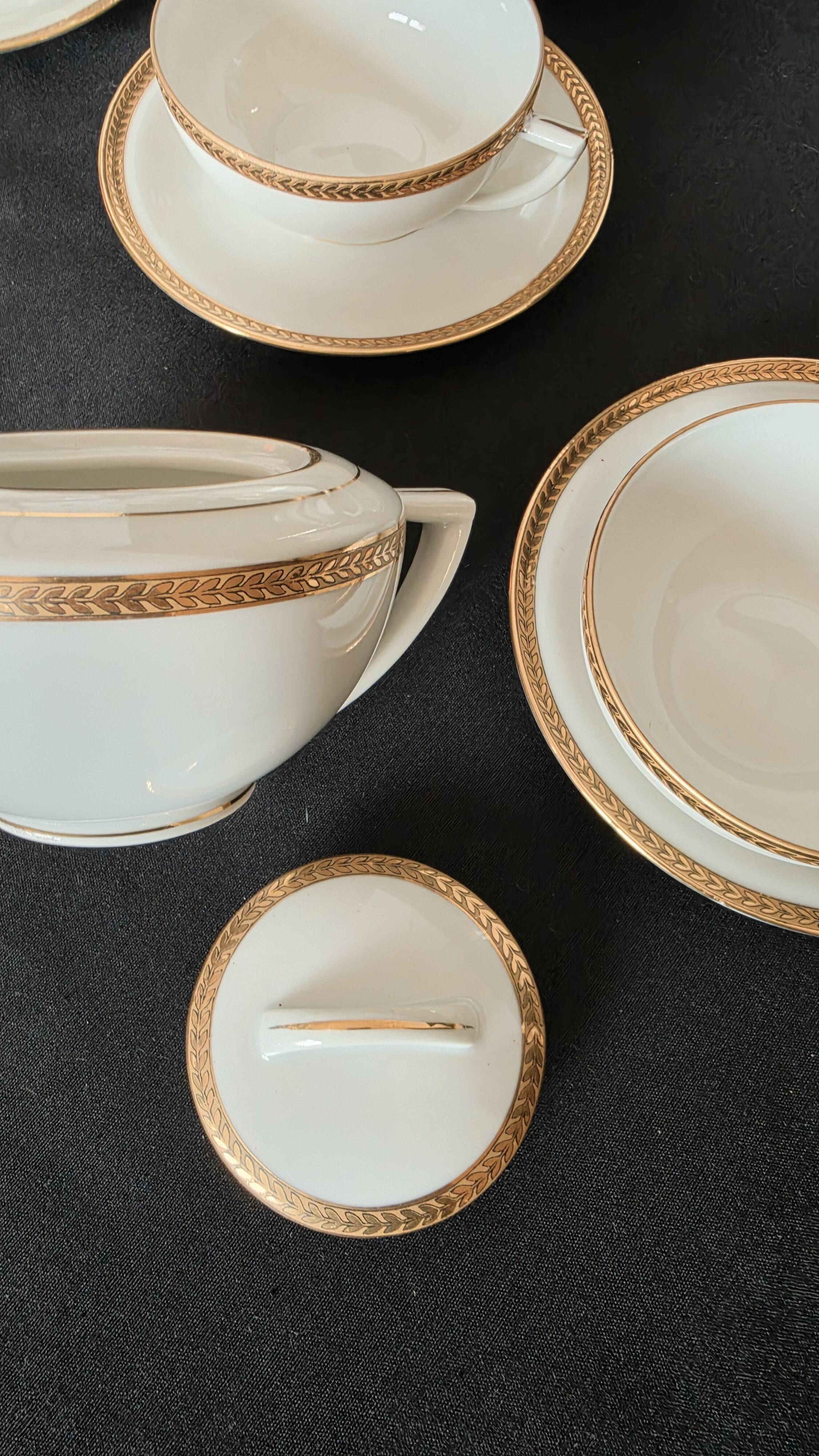 Coffee or tea service in Limoges porcelain and gold, France, Art style.