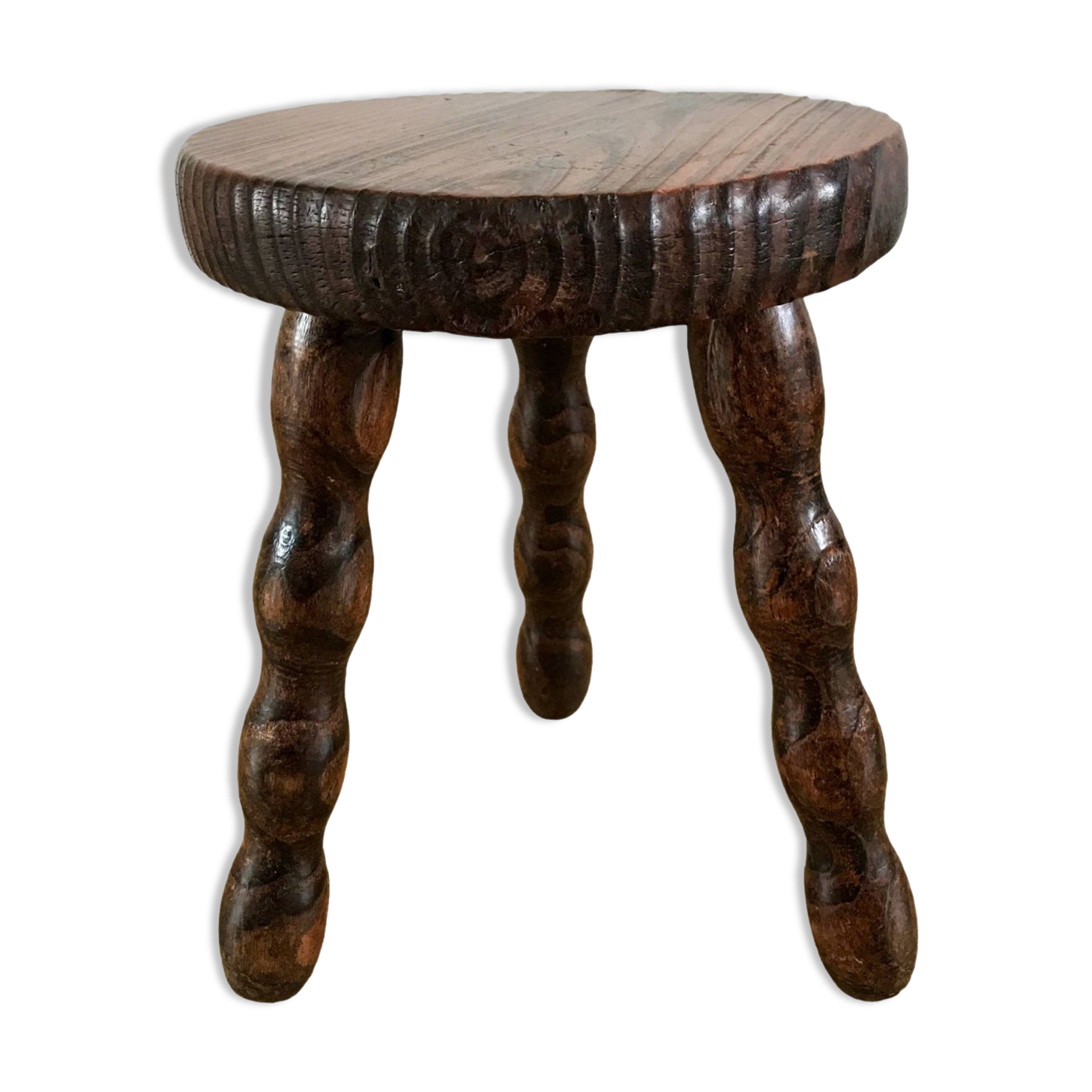 low stool in solid turned wood from the 70s