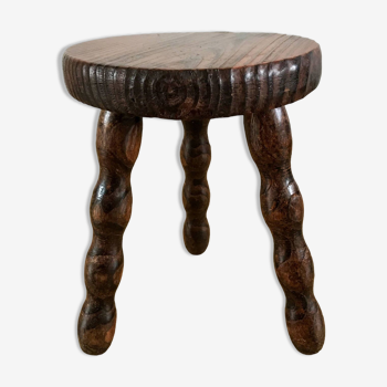 low stool in solid turned wood from the 70s