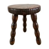 low stool in solid turned wood from the 70s