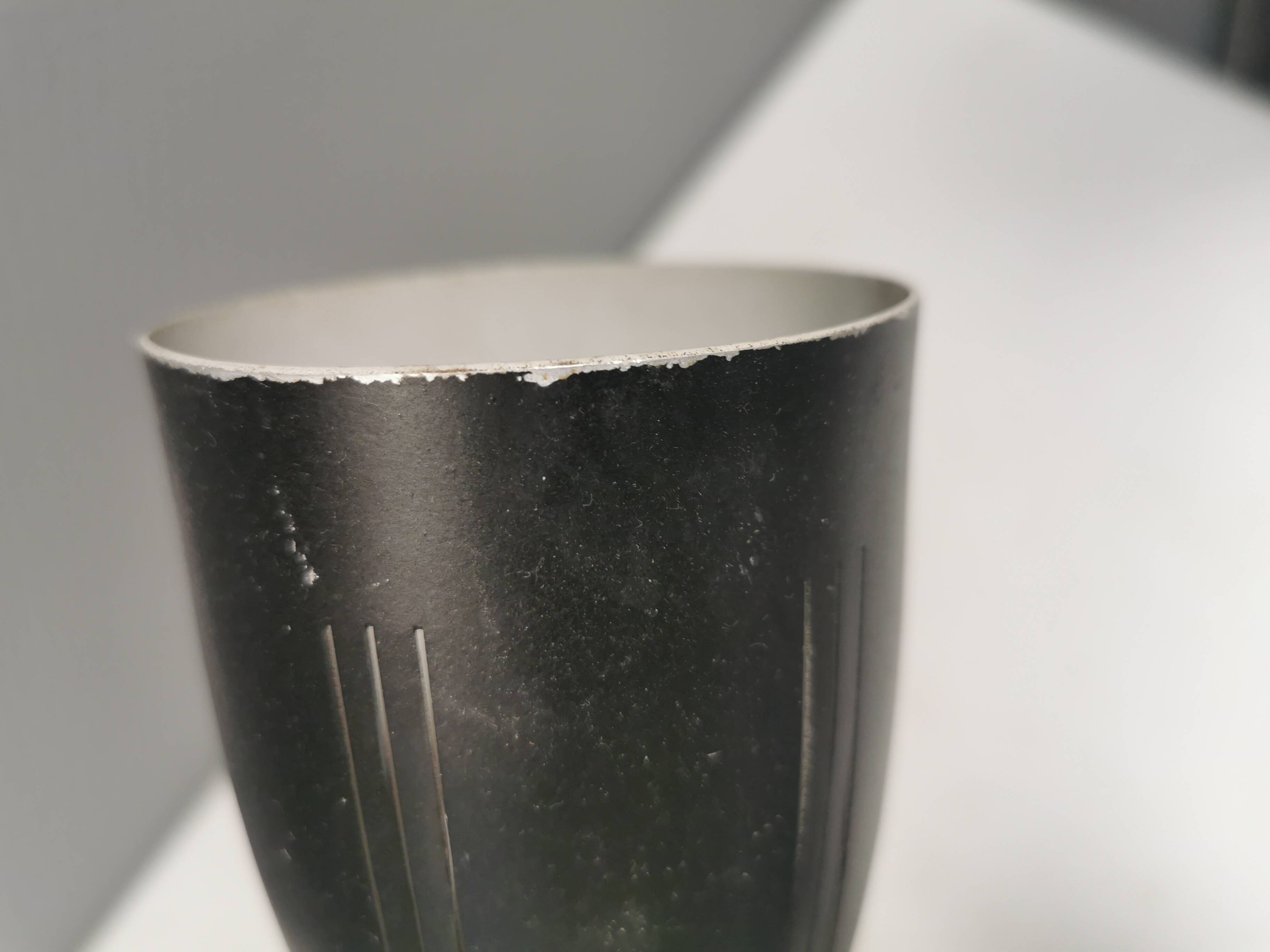 Older wall lamp with black metal shades and brass bend ‘arms’