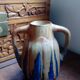 Blue enamelled flamed sandstone vase by Méténier