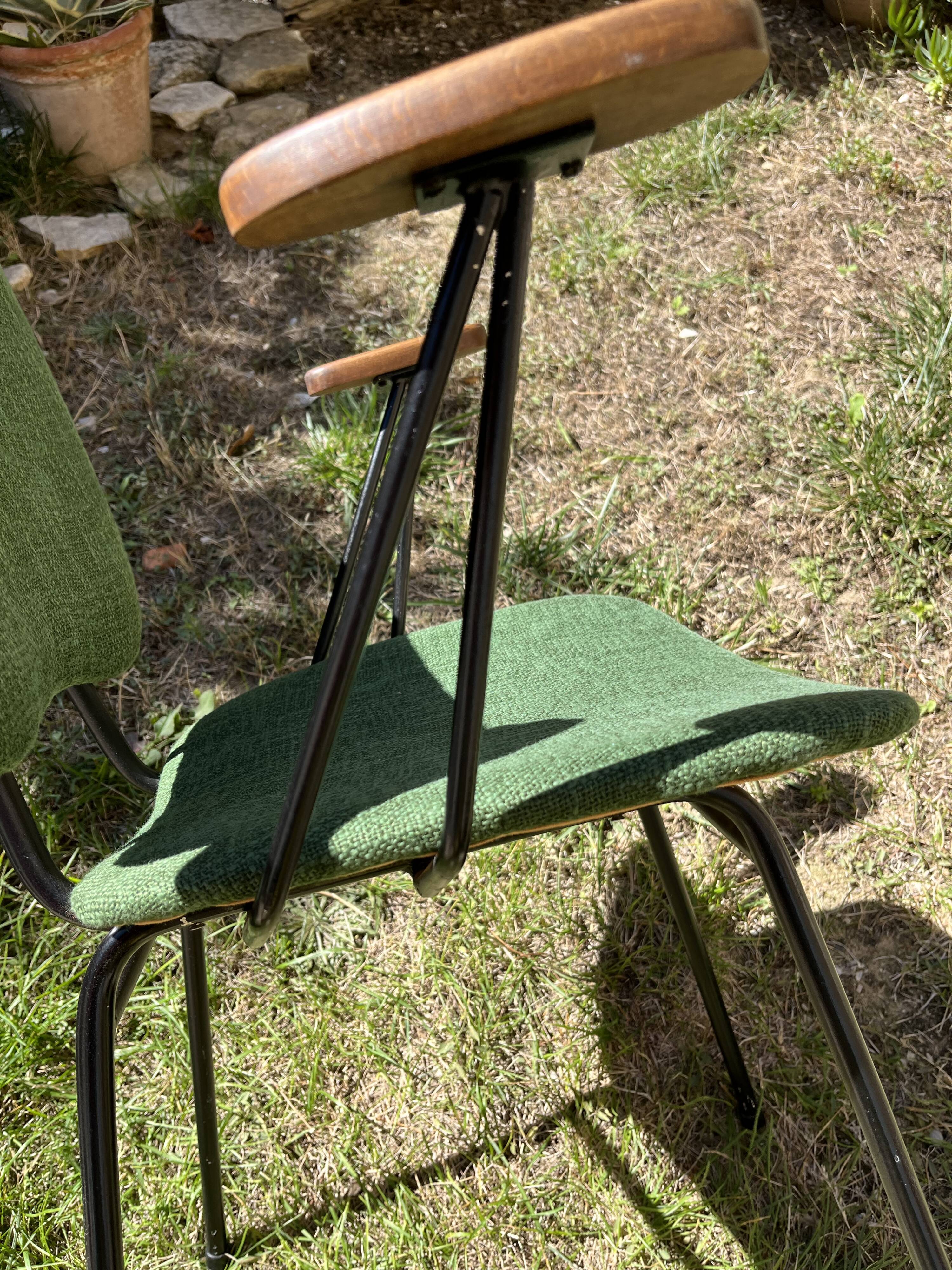 50s chair with armrests.