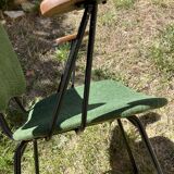 50s chair with armrests.