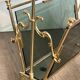 Brass magazine rack and blue-tinted glasses