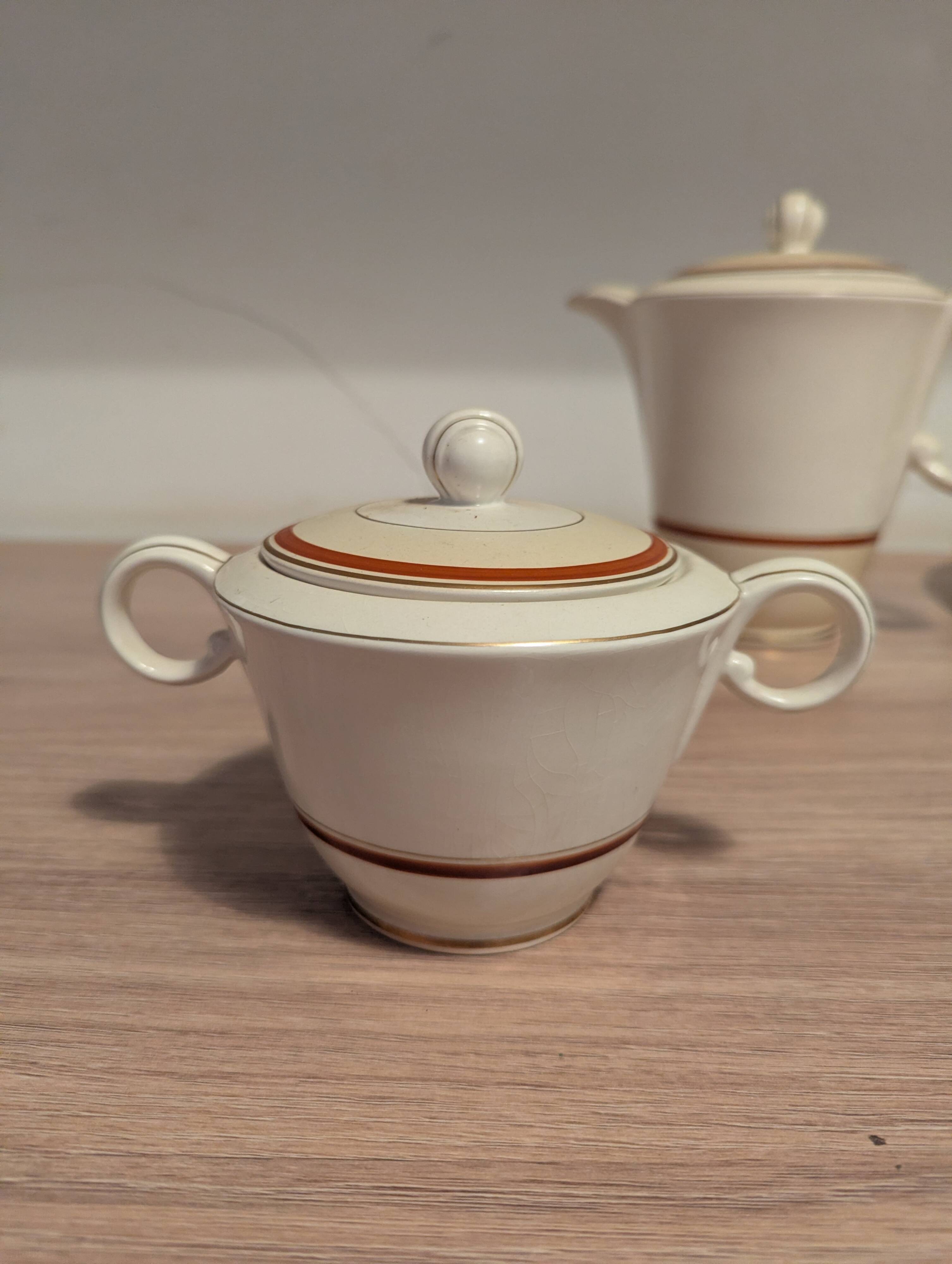 Large Longchamp set in France in earthenware Tea service, serving pieces