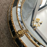 Vintage mirror in solid wood with brass and parcloses.