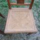 Paire de chaises art deco en cannage