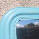 Large Louis-Philippe mirror from the 19th century in wood and stucco with a turquoise blue patina.