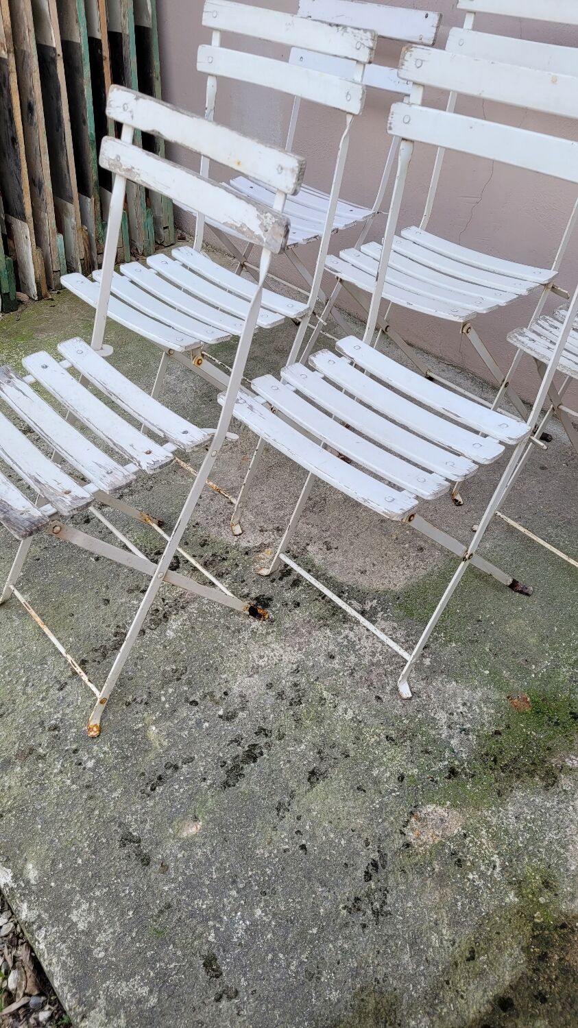 Series of 6 chairs and 1 folding armchair of iron garden bistro