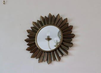 Miroir mural en métal de style vintage avec effet soleil éclatant