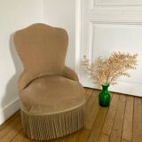 Beige velvet armchair
