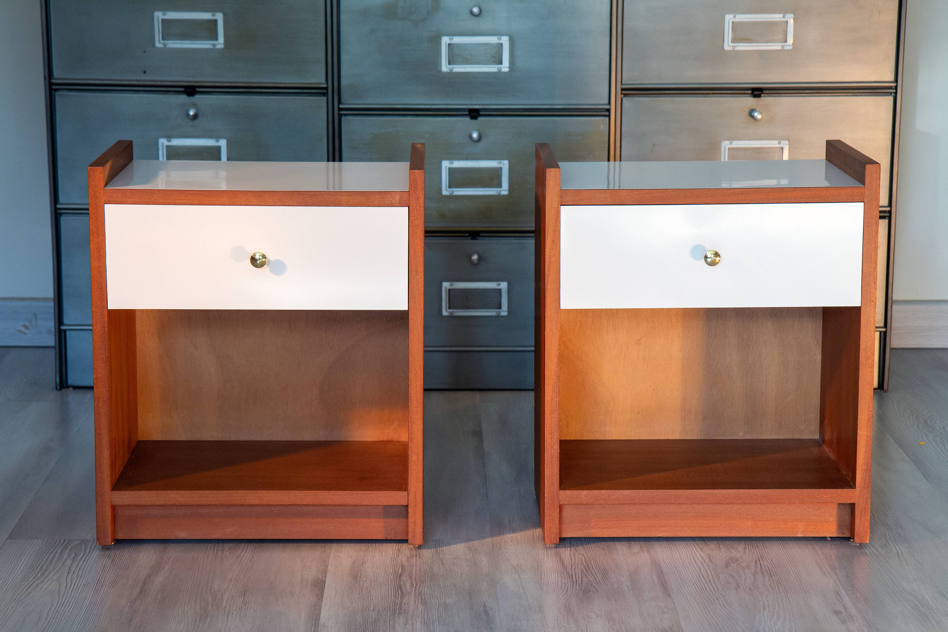 Pair of bedside tables, mahogany, white laminate and brass, 1970