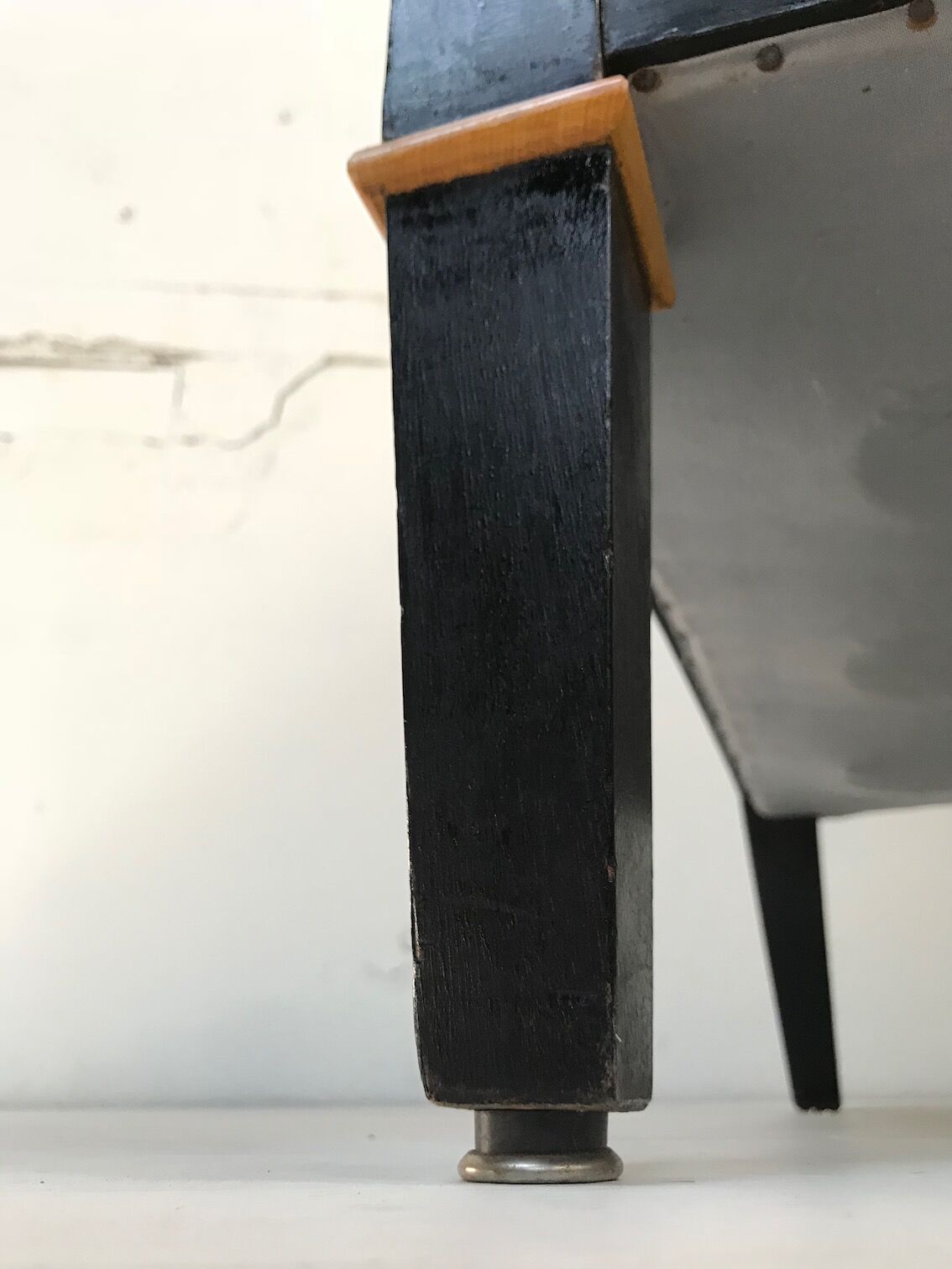 Pair of blackened wooden armchairs