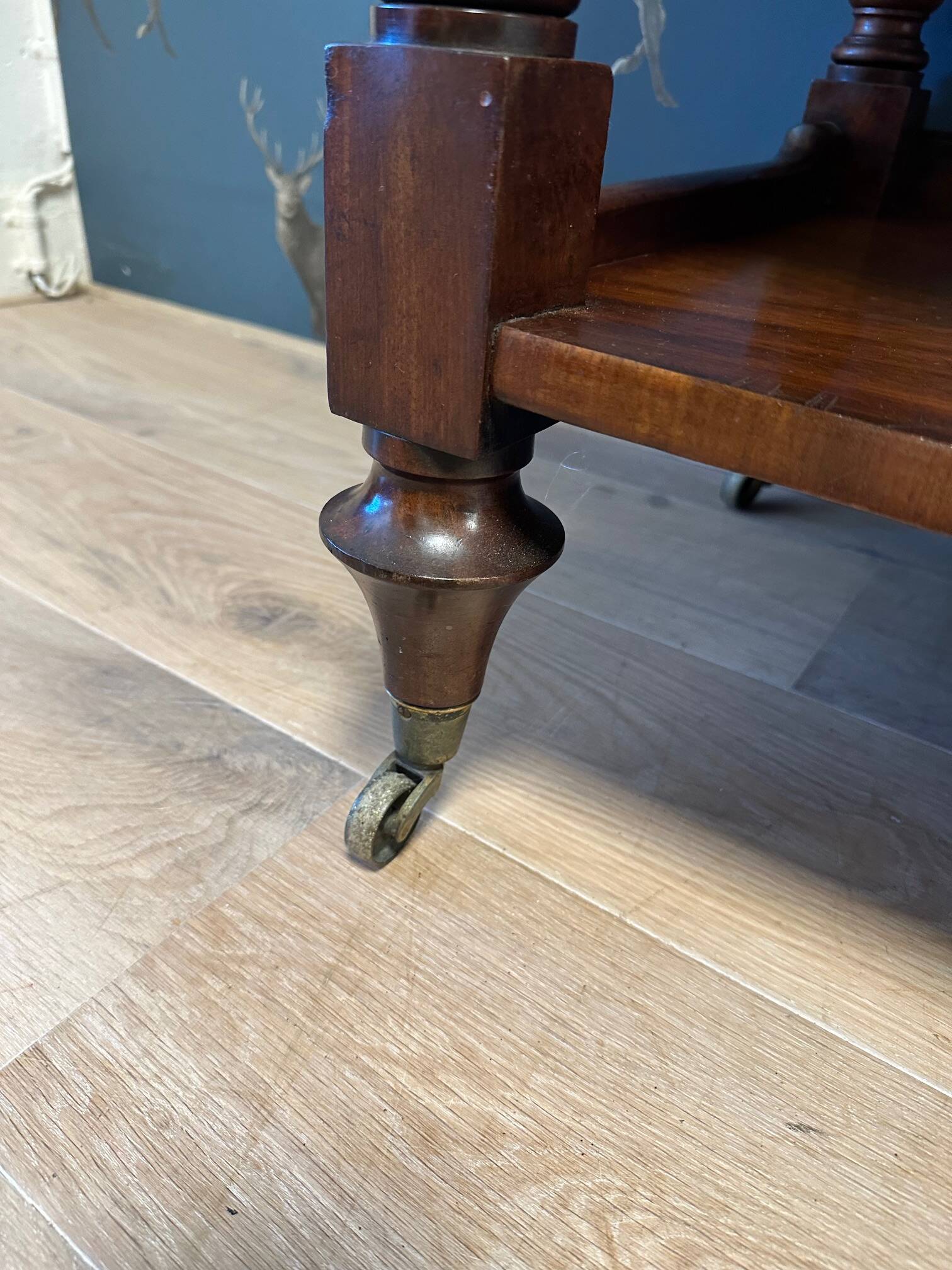 antique mahogany three-tiered étagère