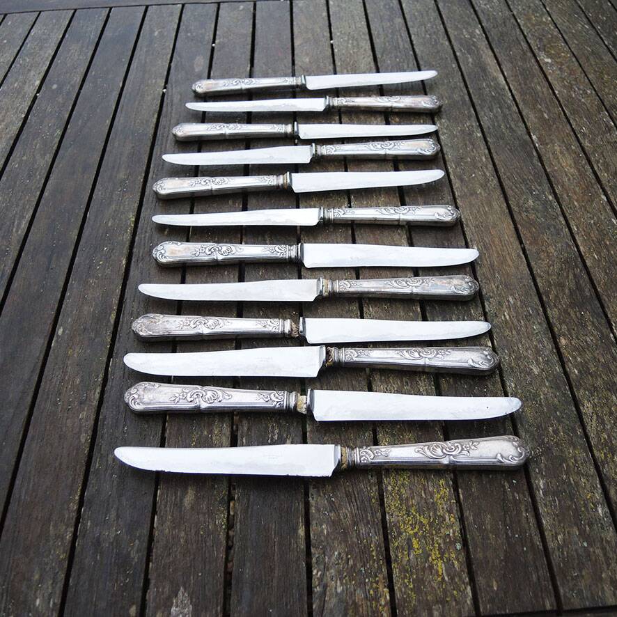 12 old Orbrille stainless steel table knives