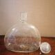 Clear bubble glass bottle molded for easy manual gripping