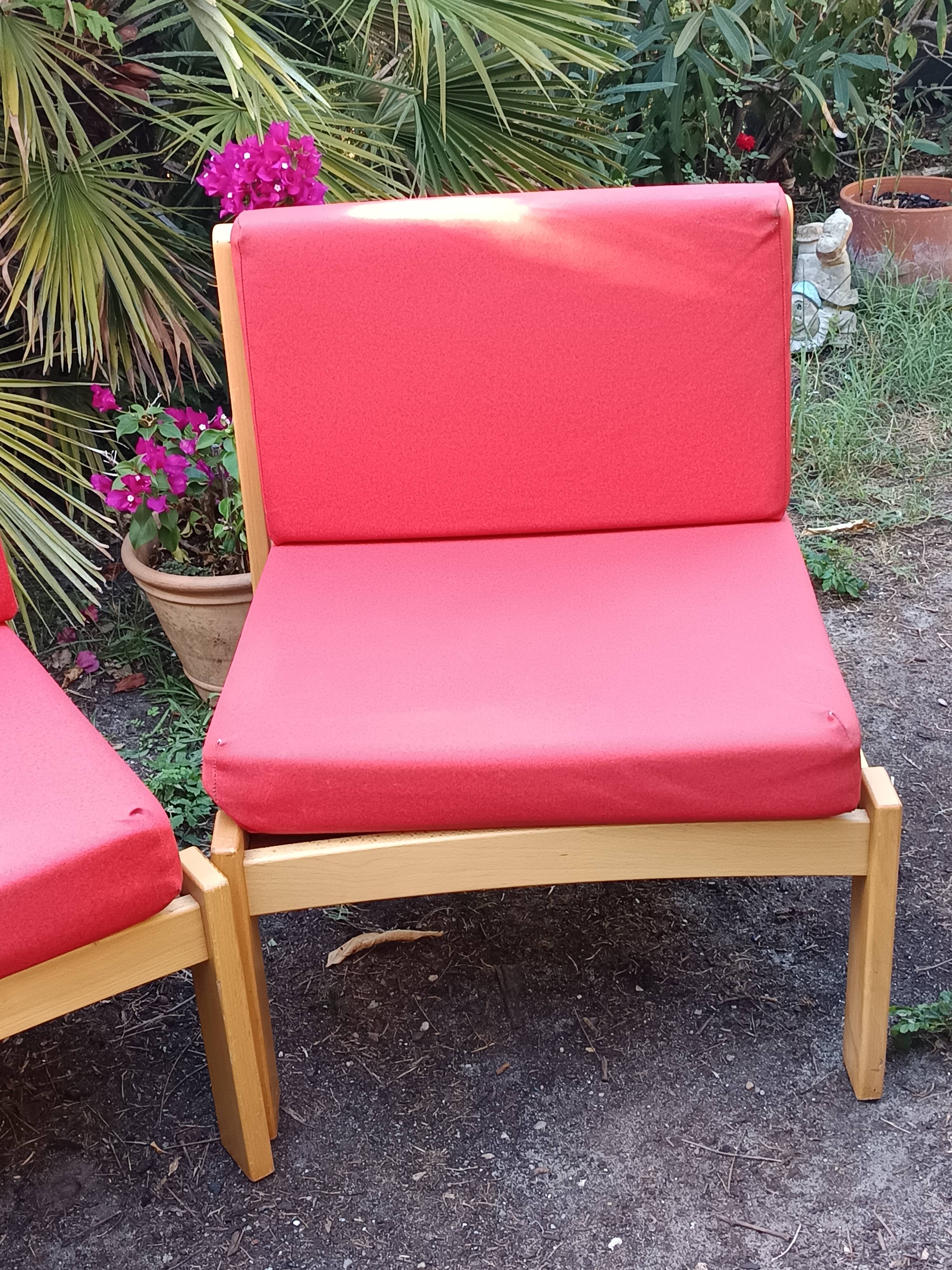 Set of 3 vintage armchairs from the 60s/70s – light wood and red faux leather.