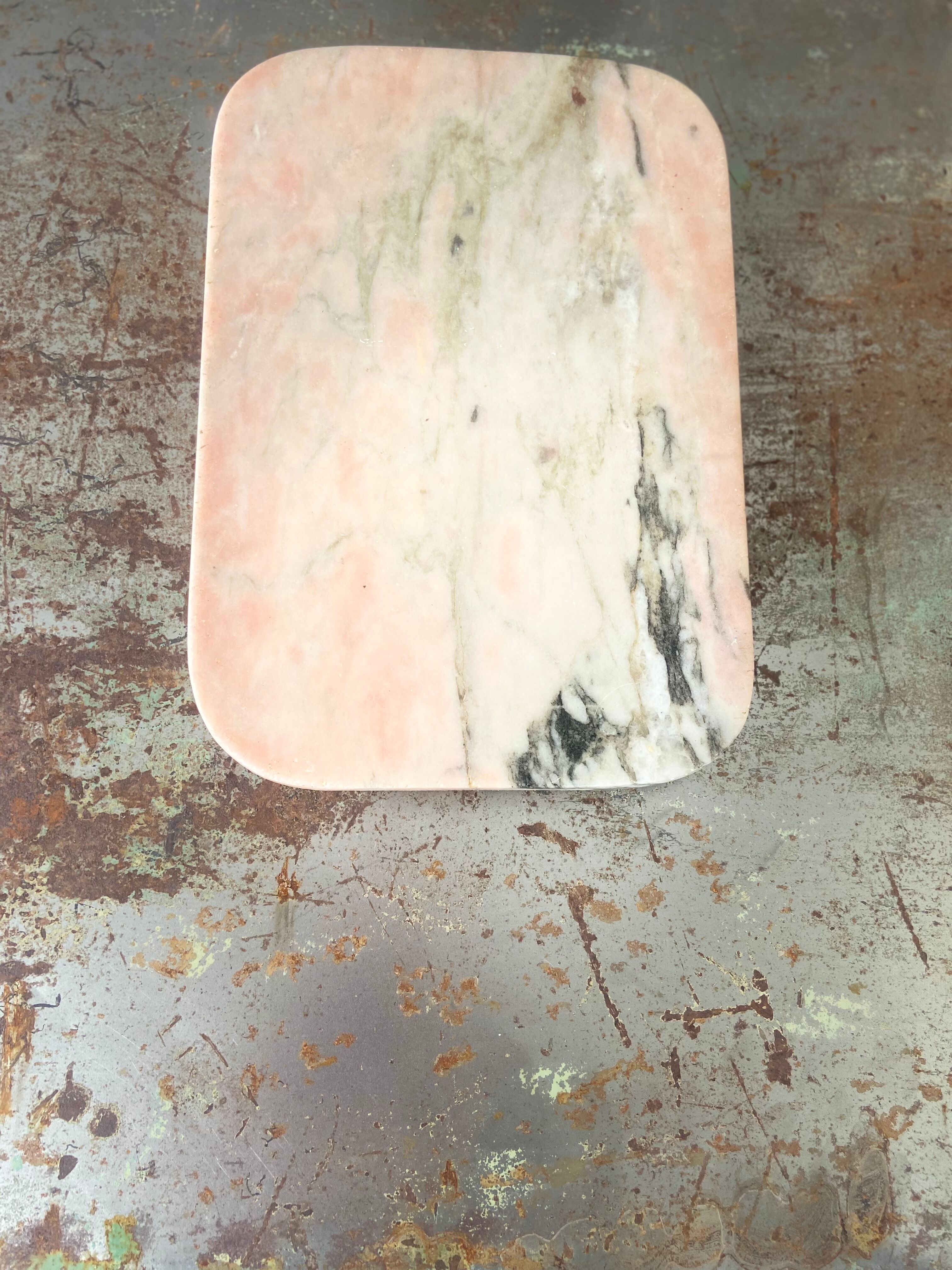 Cutting board in pink natural marble
