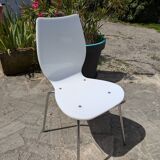 White plexiglass chair