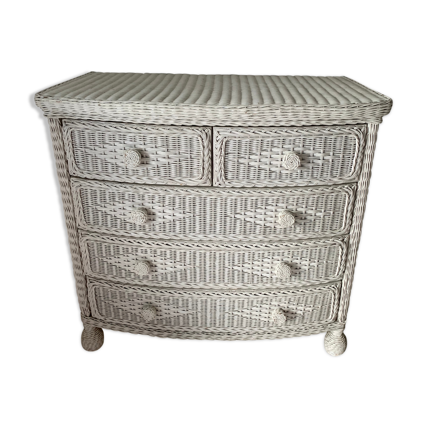 White dresser in vintage rattan